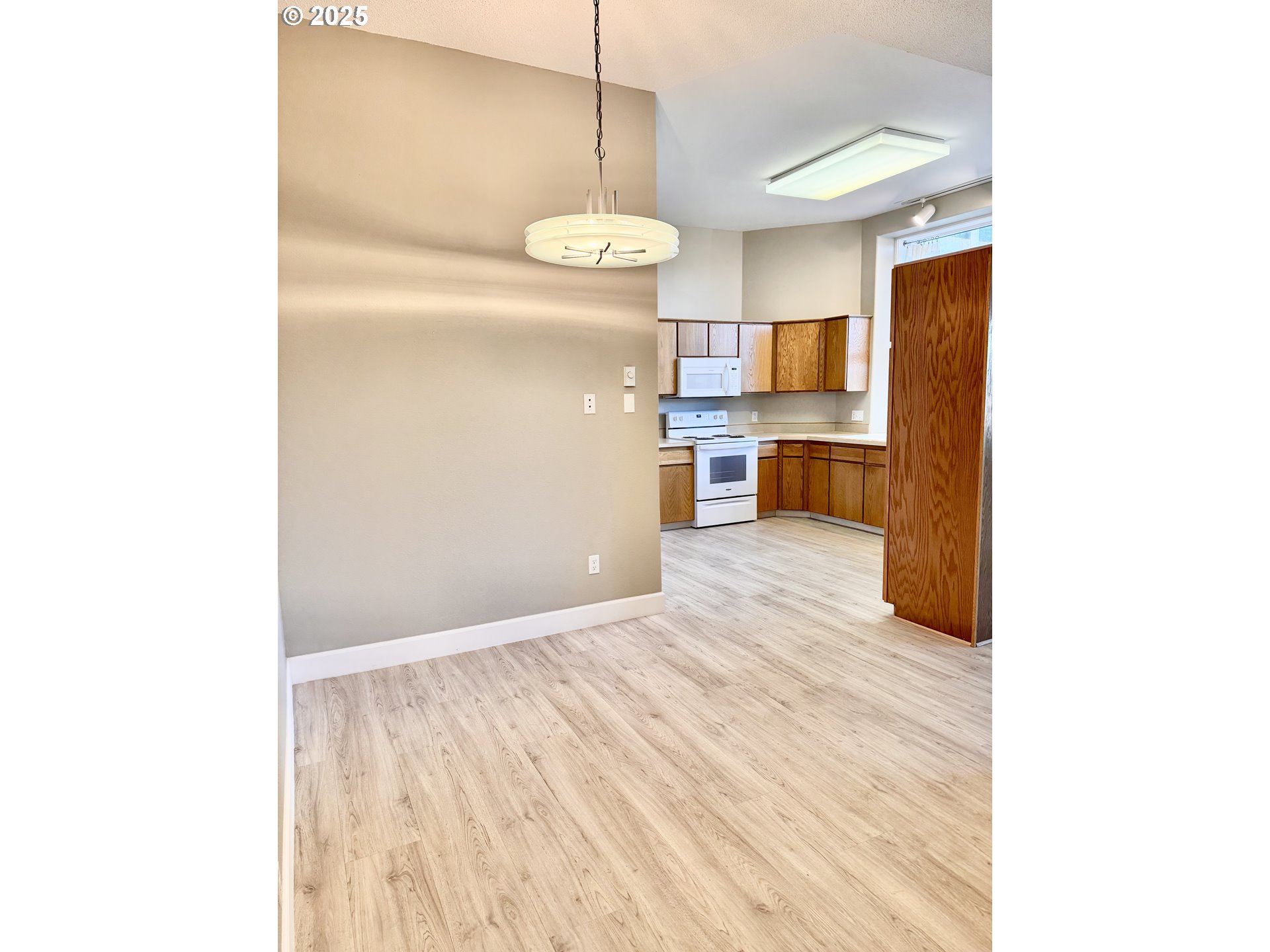 2365 4th Street, Unit 205 Baker City, OR 97814 - Photo 11 of 23 a view of a kitchen and a window