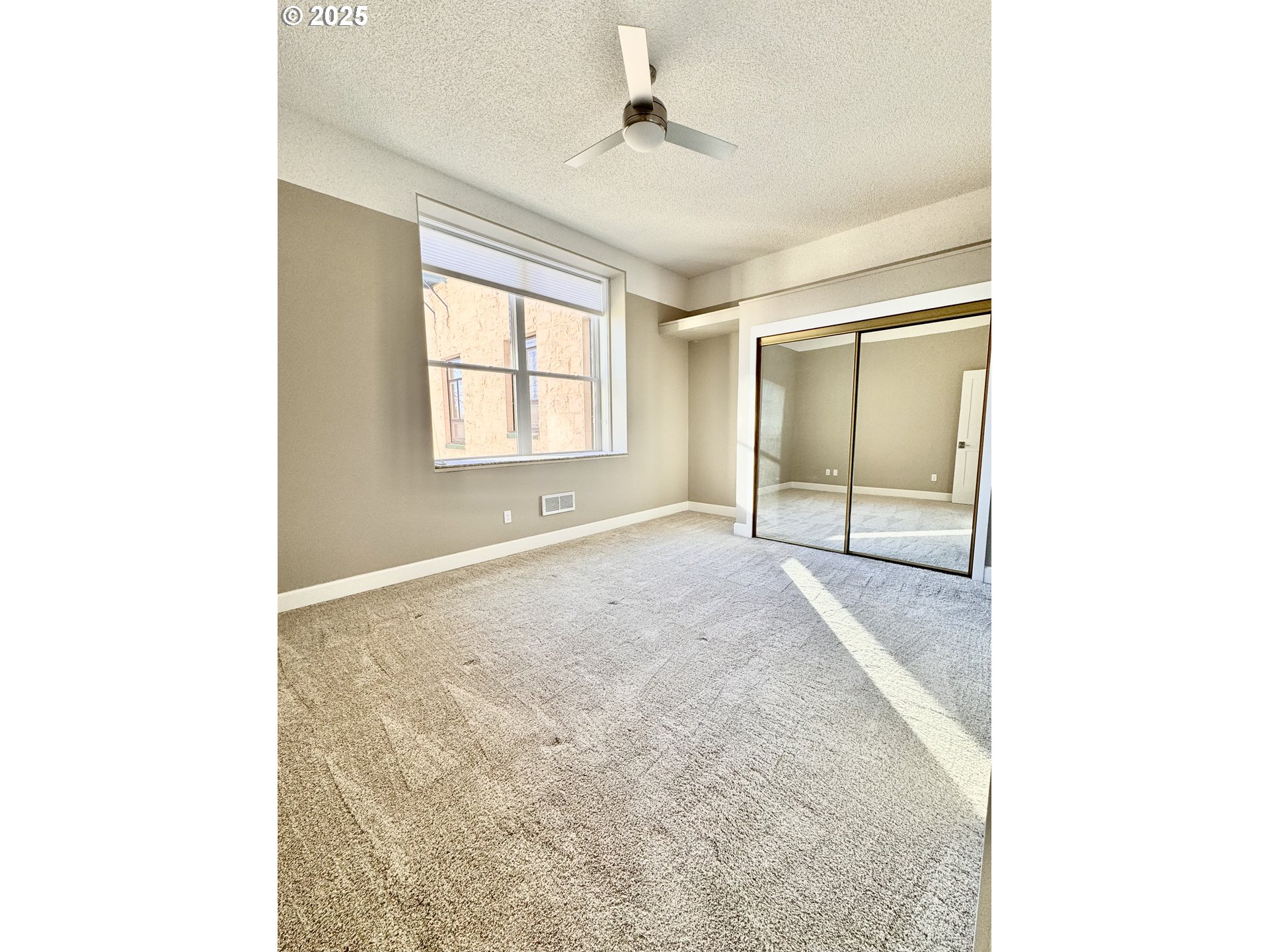 2365 4th Street, Unit 205 Baker City, OR 97814 - Photo 17 of 23 a view of an empty room with a window