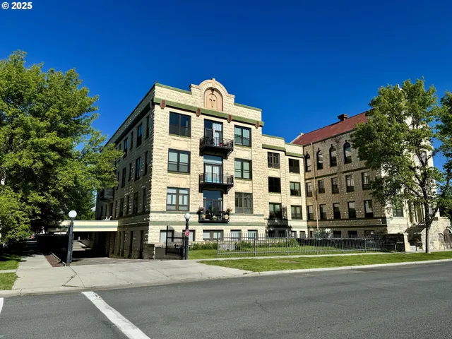 a front view of a building with street view