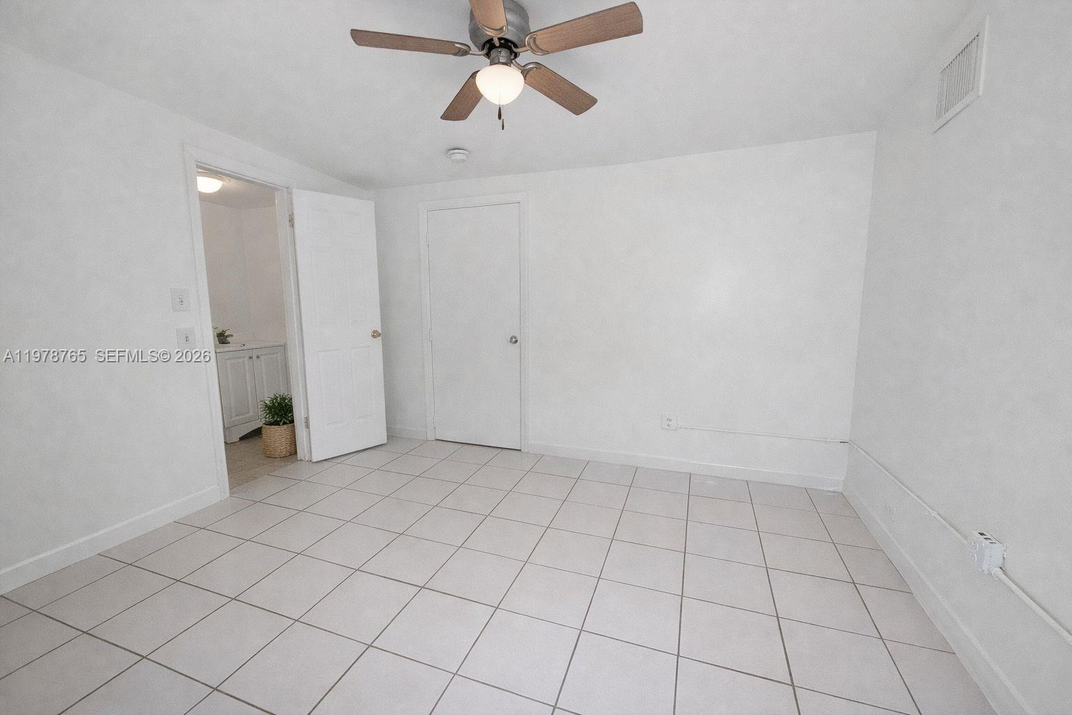 2227 Southwest 2nd Terrace, Unit 2227 Miami, FL 33135 - Photo 5 of 10 a view of an empty room and window