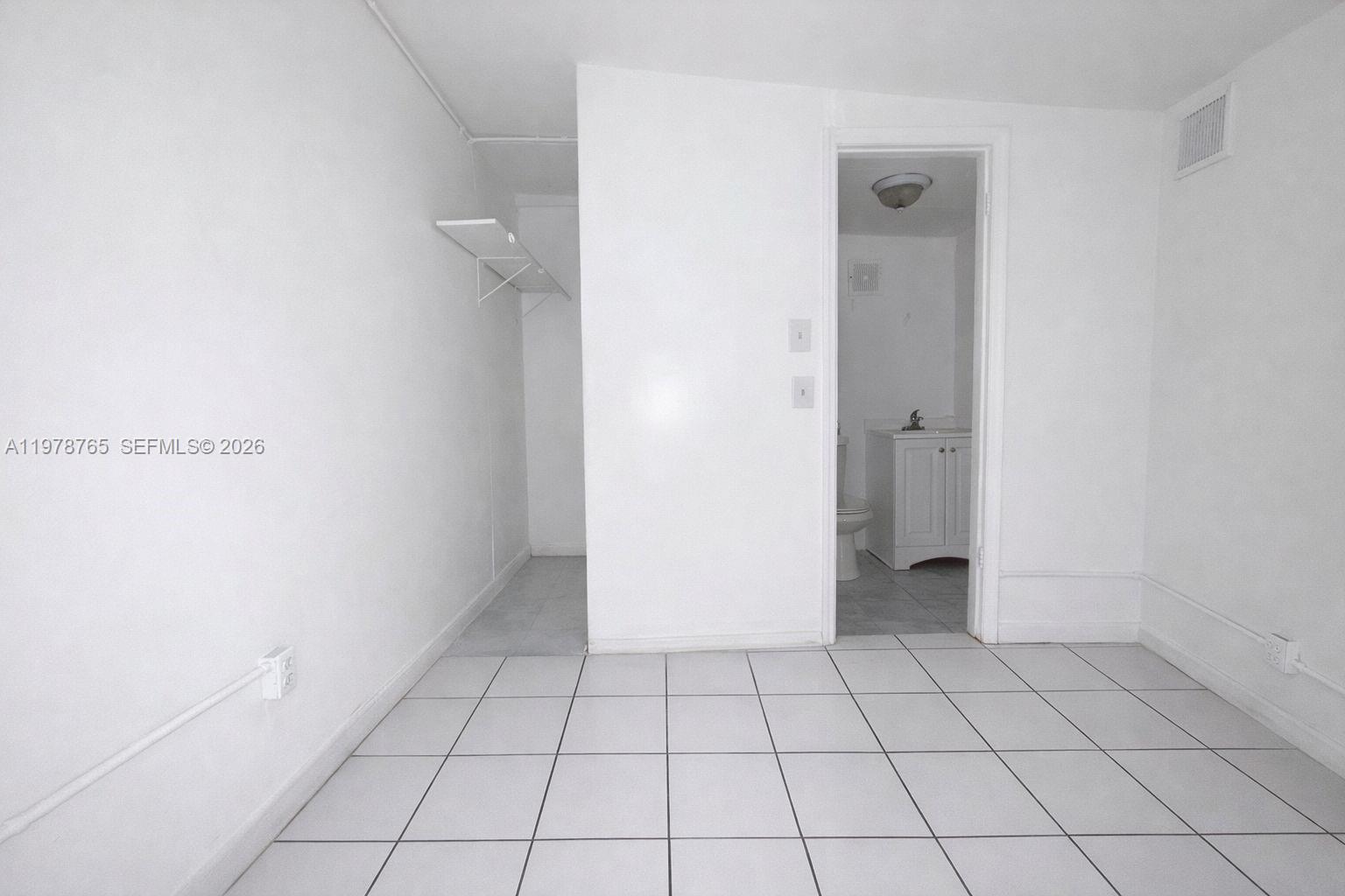 2227 Southwest 2nd Terrace, Unit 2227 Miami, FL 33135 - Photo 6 of 10 a view of an empty room
