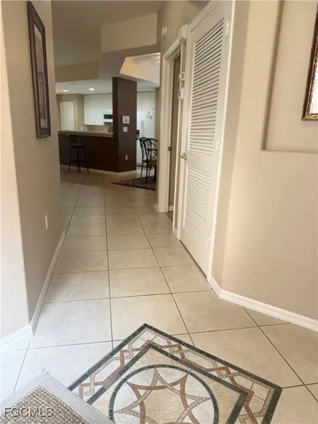 a view of a hallway with a couch