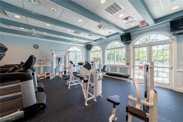 a view of outdoor space with swings and slides