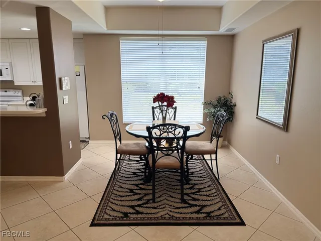 a bathroom with a double vanity sink and mirror