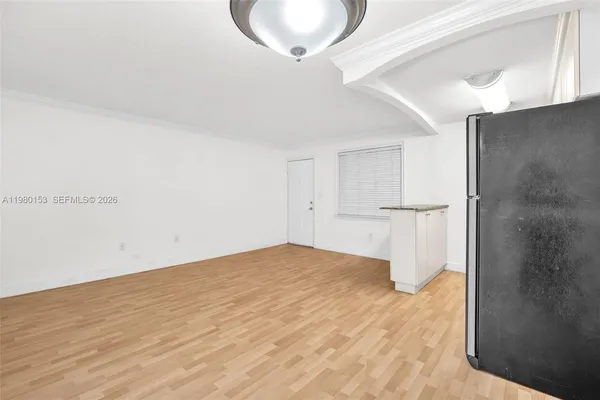 a view of a kitchen with a sink