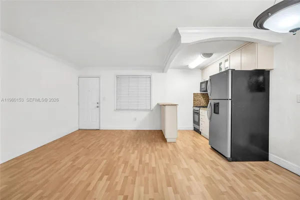 a view of backyard and tree