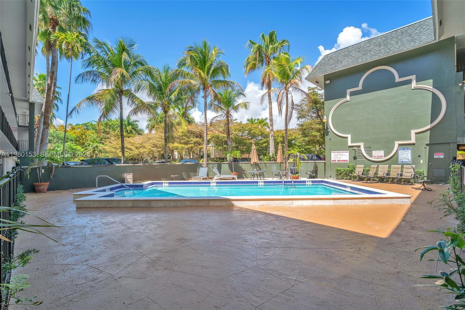 3245 Virginia Street, Unit 39 Miami, FL 33133 - Photo 22 of 25 a view of outdoor space yard and swimming pool
