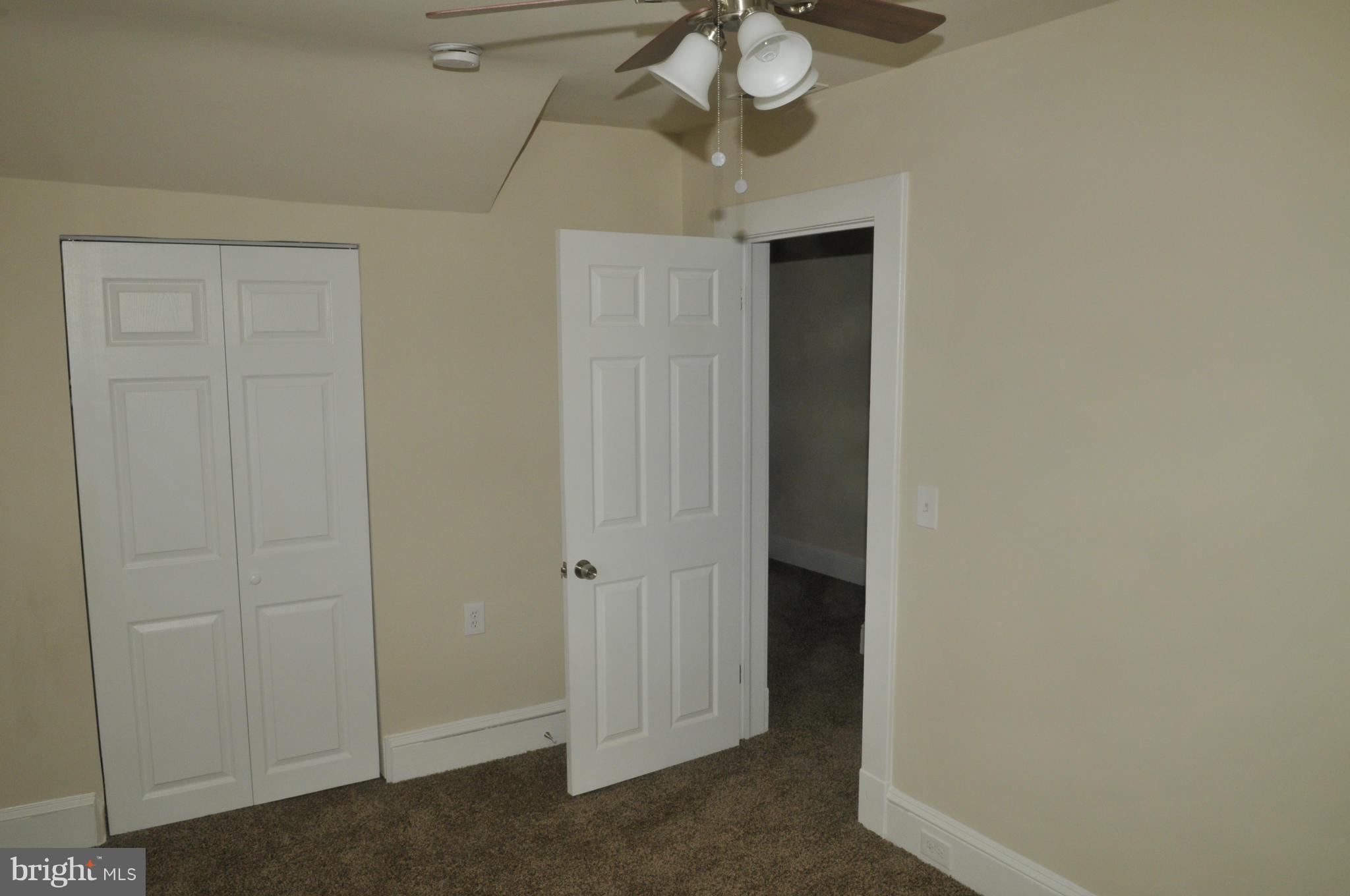 3911 Annapolis Road Halethorpe, MD 21227 - Photo 11 of 24 a view of a livingroom and a chandelier fan