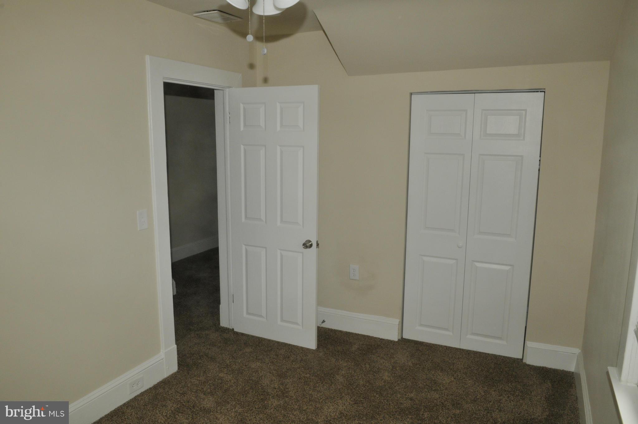 3911 Annapolis Road Halethorpe, MD 21227 - Photo 12 of 24 an empty room with closet
