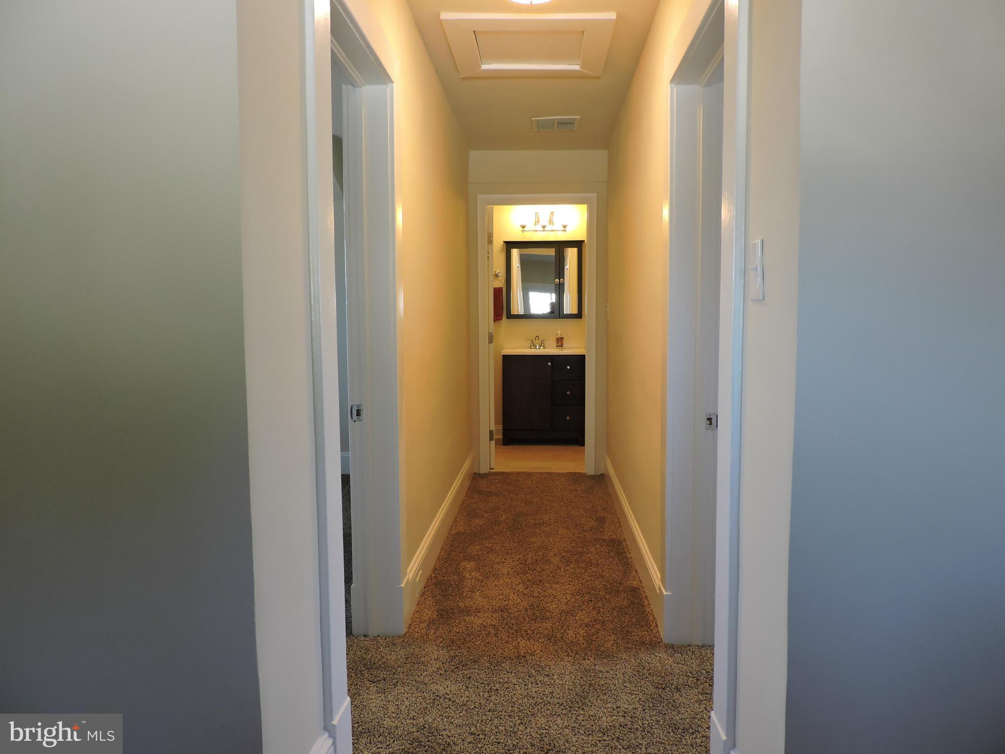 3911 Annapolis Road Halethorpe, MD 21227 - Photo 17 of 24 a view of a bathroom from a hallway