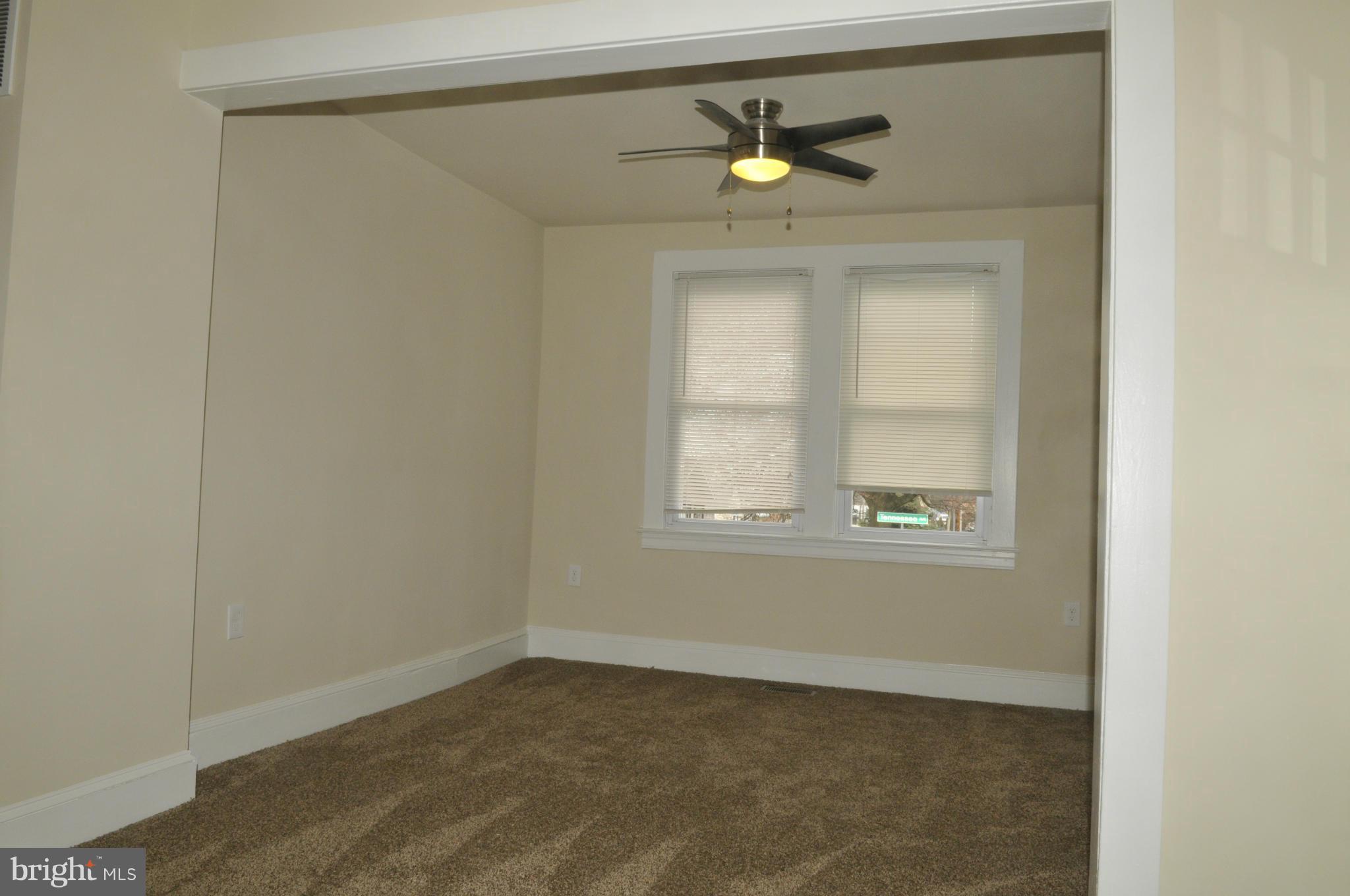 3911 Annapolis Road Halethorpe, MD 21227 - Photo 5 of 24 a view of empty room with window