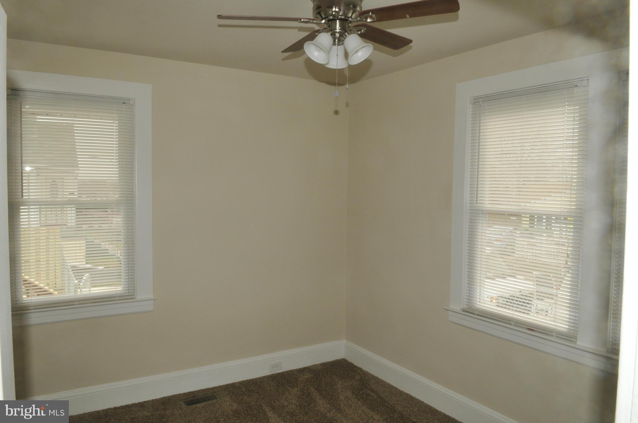 3911 Annapolis Road Halethorpe, MD 21227 - Photo 10 of 24 an empty room with a window
