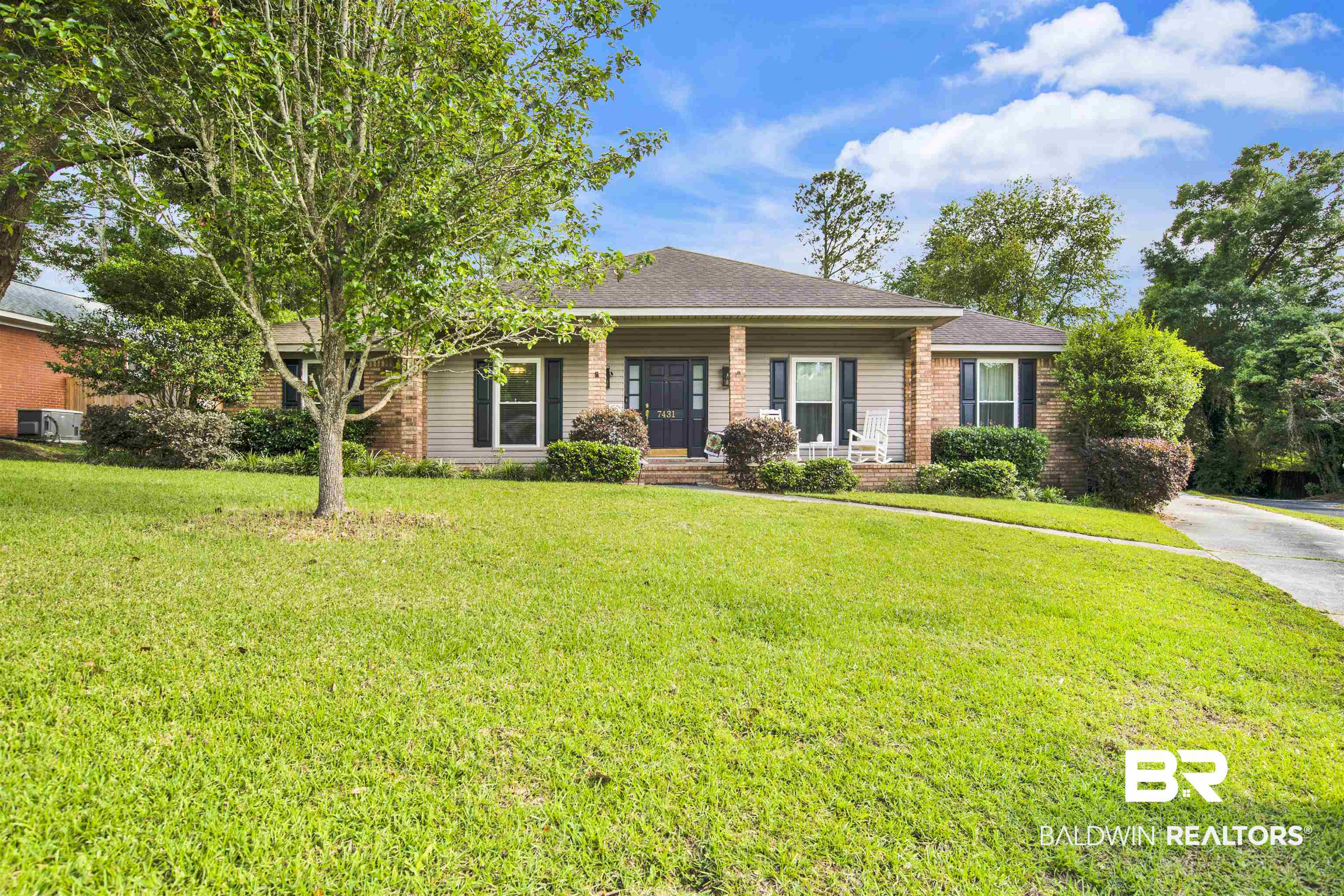 7431 Summer Court Mobile, AL 36695 - Photo 1 of 37 Single story home with a front lawn, a porch, brick siding, and roof with shingles