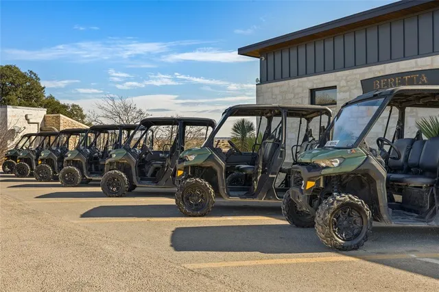 a view of a garage with parked cars