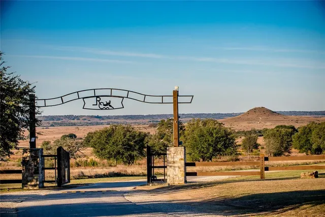 a view of a building with a mountain