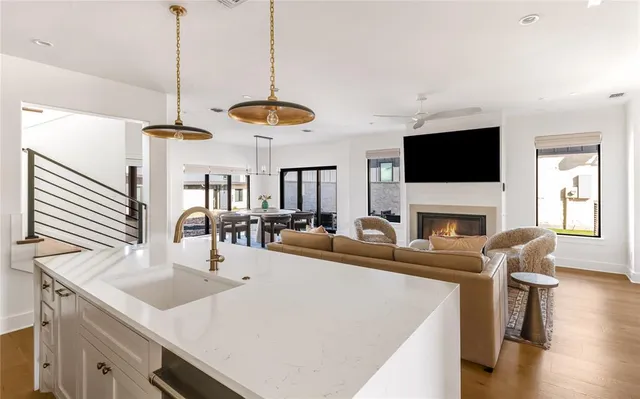 a view of living room with furniture and a flat screen tv