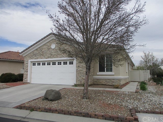 19406 Shamrock Road Apple Valley, CA 92308 - Photo 1 of 1 a sign that is on the side of a road