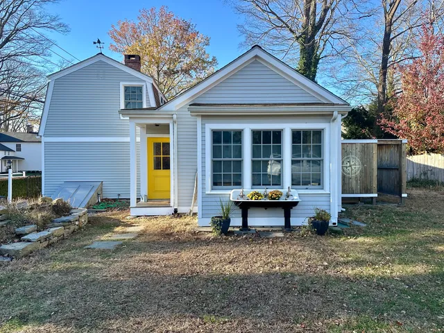 a view of a house that has a patio