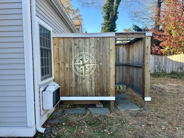 a wooden door with outdoor space