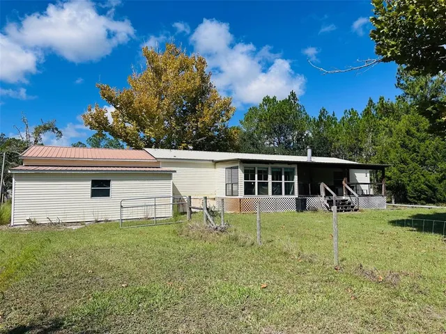 a house view with a garden space