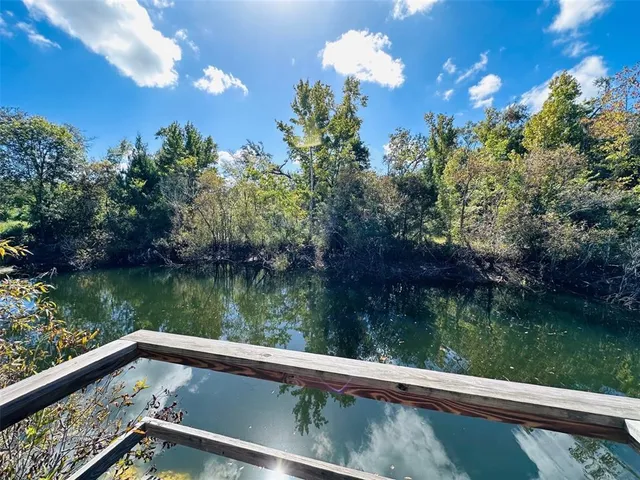 a view of a lake from a balcony