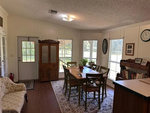 a view of a livingroom with furniture and window