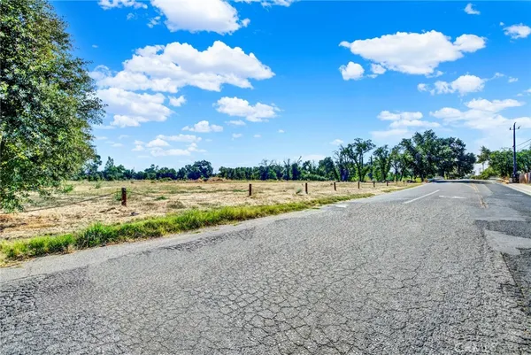 a view of a lake with a yard