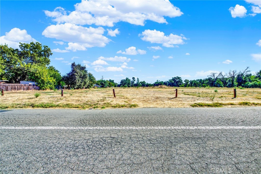 0 Toomes Corning, CA 96021 - Photo 10 of 20 a view of a lake with a yard