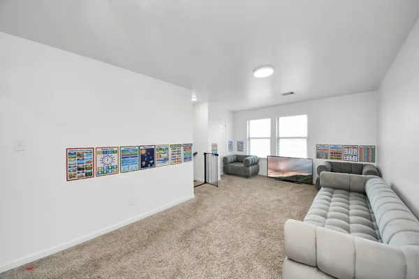 a living room with furniture and a couch