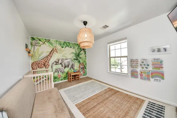 wooden floor in a livingroom with a window
