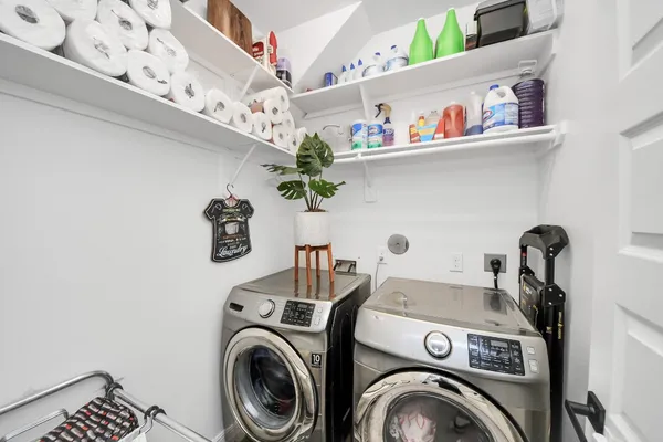 a utility room with dryer and washer