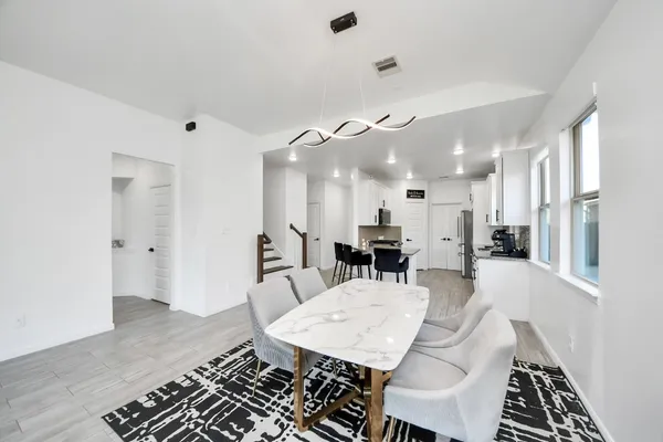 a view of a dining room with furniture