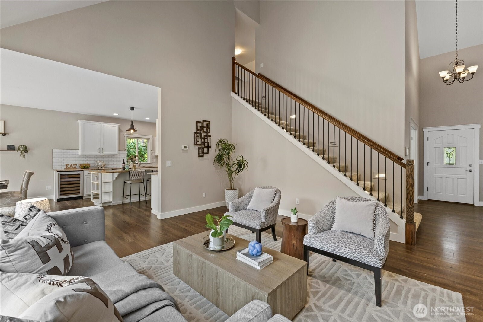 22005 260th Avenue Southeast Maple Valley, WA 98038 - Photo 13 of 39 a living room with furniture and wooden floor