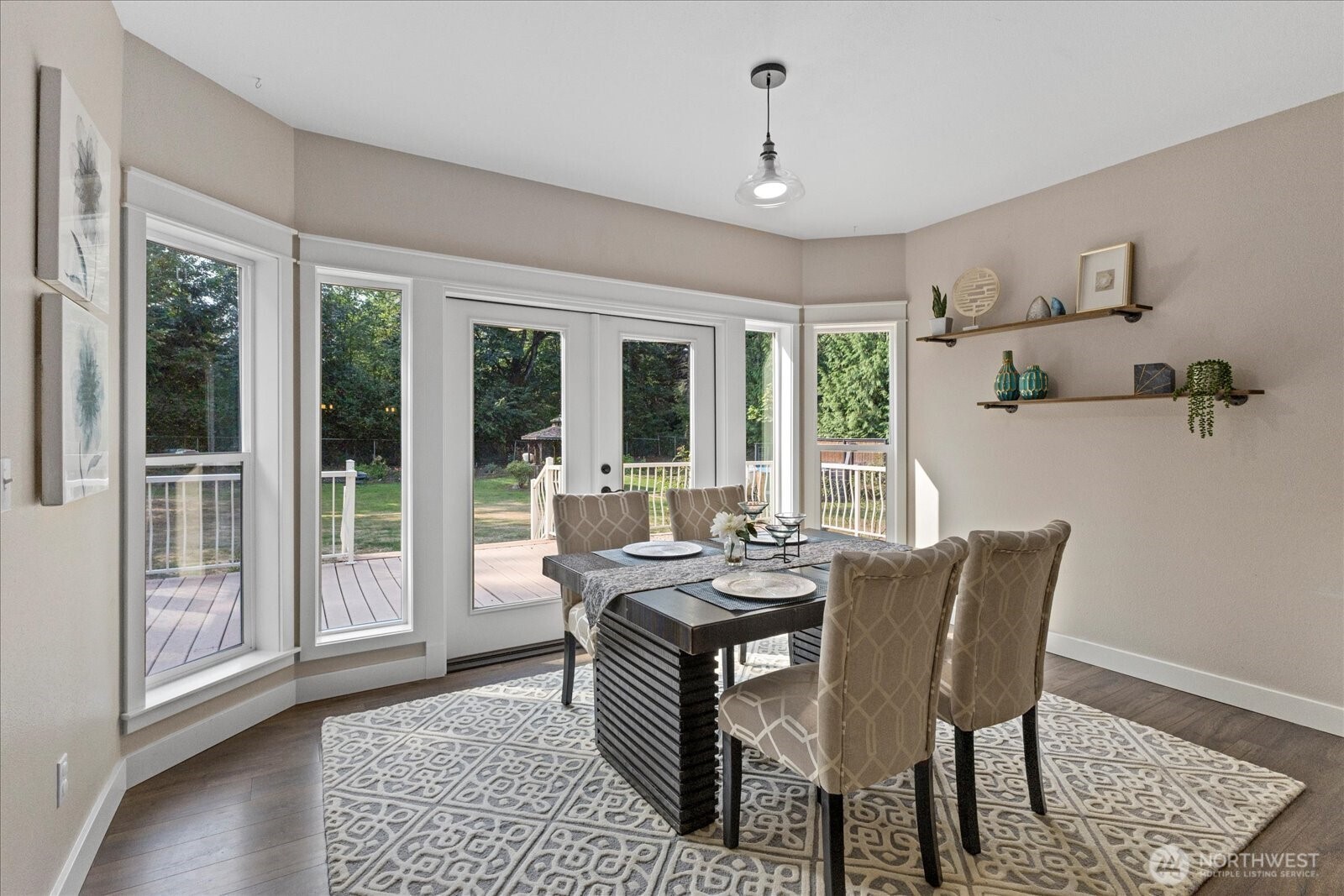 22005 260th Avenue Southeast Maple Valley, WA 98038 - Photo 14 of 39 a dining room with furniture window and wooden floor