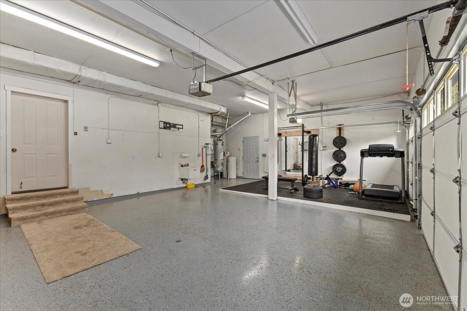22005 260th Avenue Southeast Maple Valley, WA 98038 - Photo 20 of 39 a view of a room with gym equipment