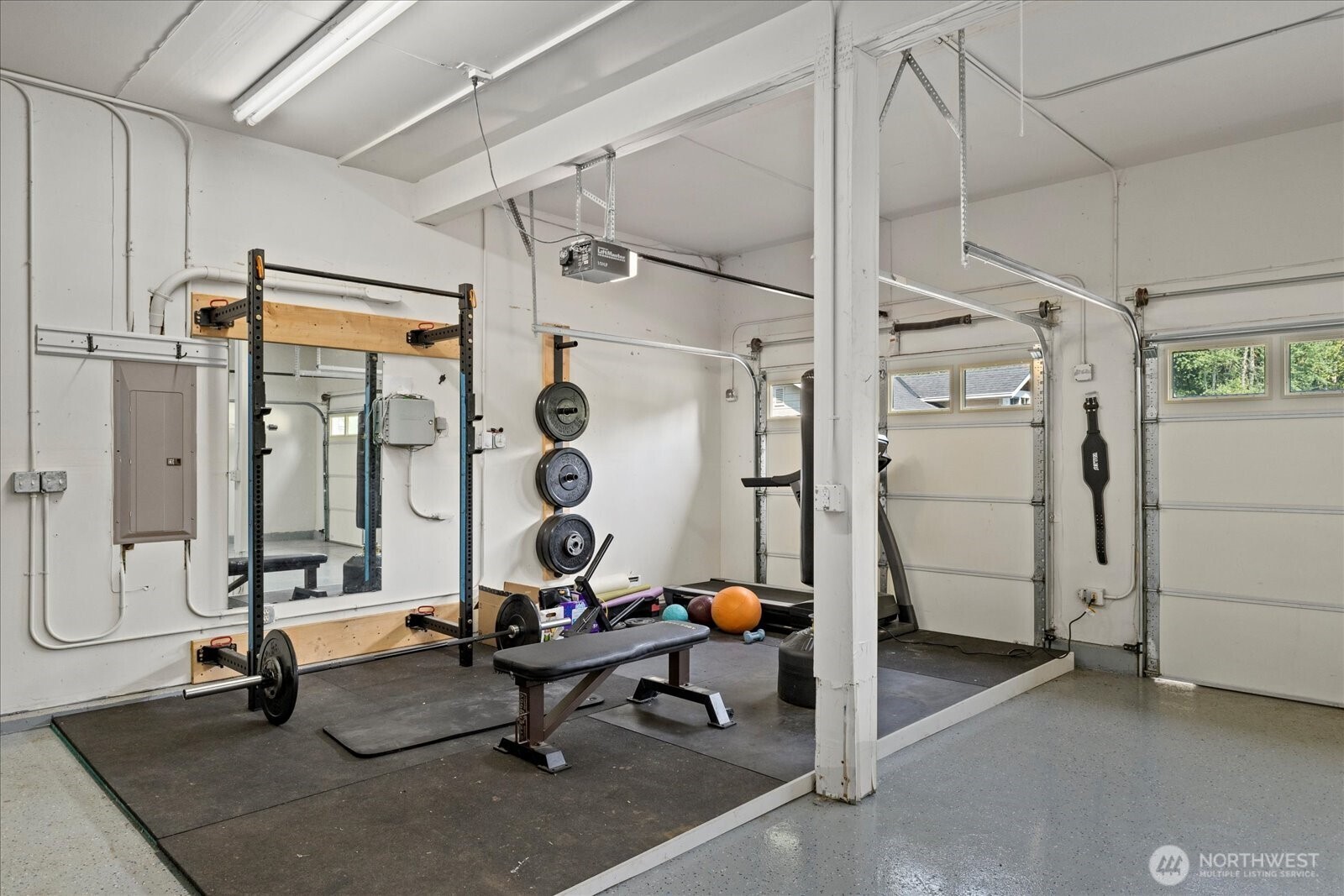 22005 260th Avenue Southeast Maple Valley, WA 98038 - Photo 21 of 39 a living room with patio furniture and a large window