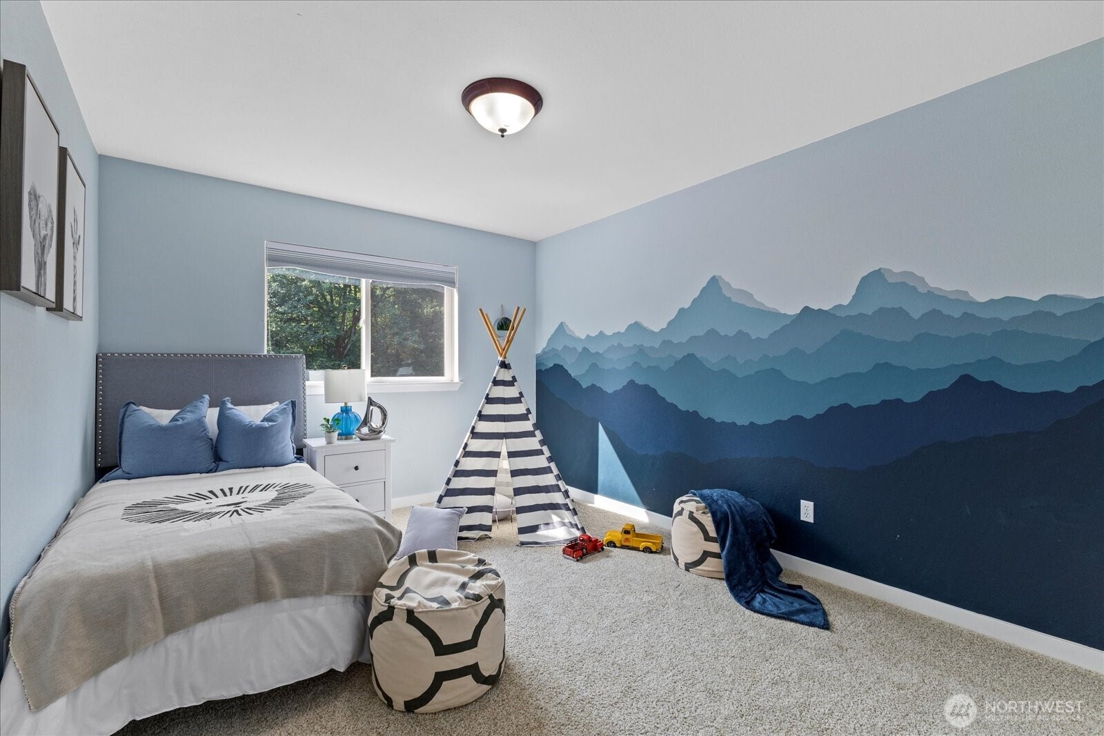 22005 260th Avenue Southeast Maple Valley, WA 98038 - Photo 22 of 39 a bedroom with bed and a window