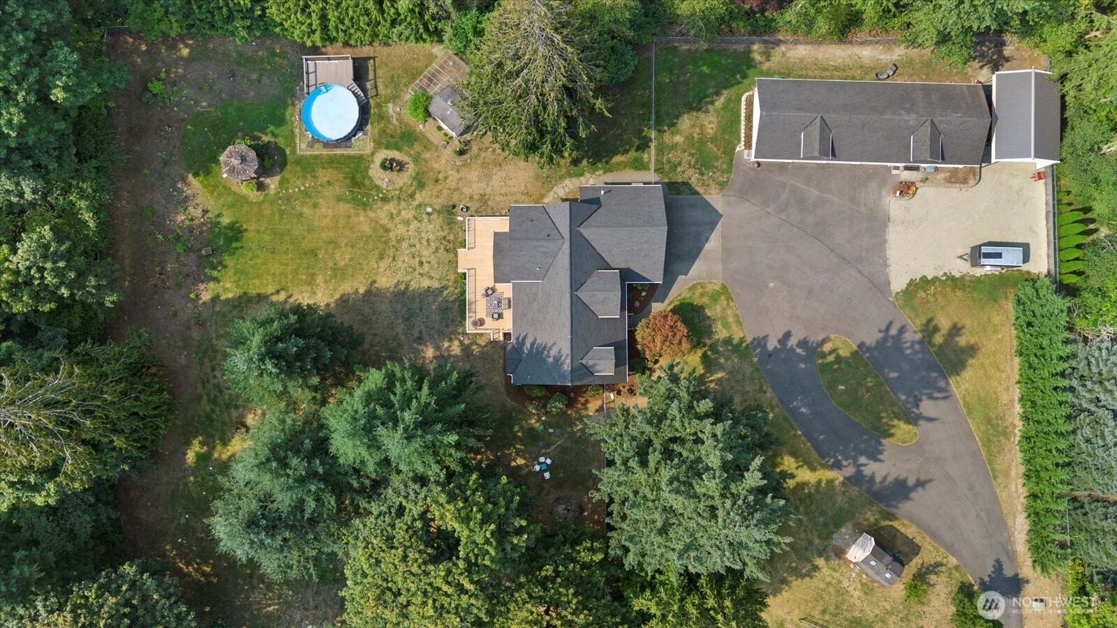 22005 260th Avenue Southeast Maple Valley, WA 98038 - Photo 32 of 39 an aerial view of a house with a yard and garden