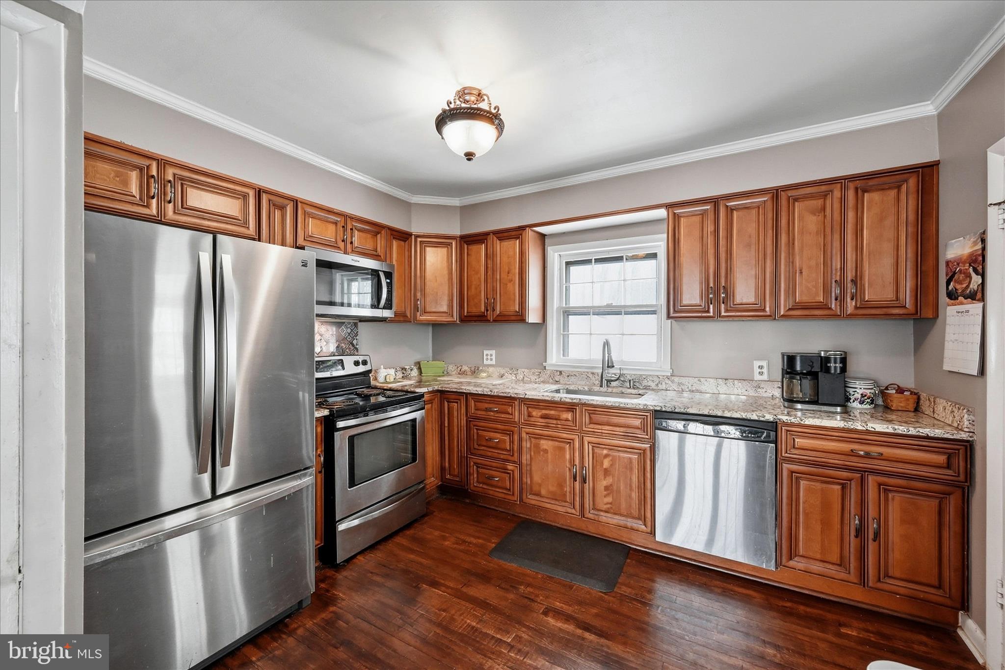 18758 Telegraph Springs Road Purcellville, VA 20132 - Photo 12 of 59 a kitchen with stainless steel appliances granite countertop a refrigerator a stove a sink cabinets and a refrigerator