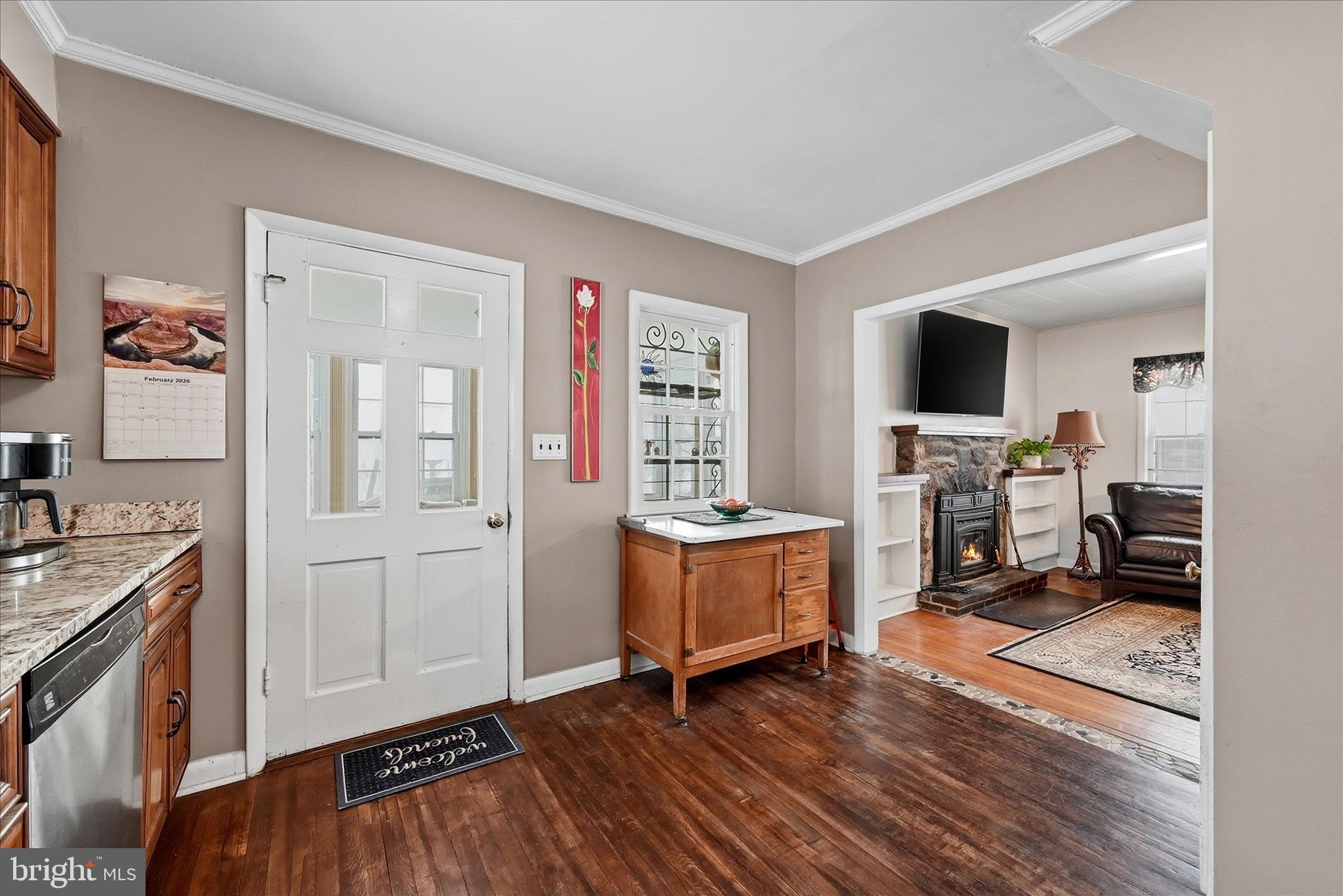 18758 Telegraph Springs Road Purcellville, VA 20132 - Photo 13 of 59 a living room with furniture and a flat screen tv