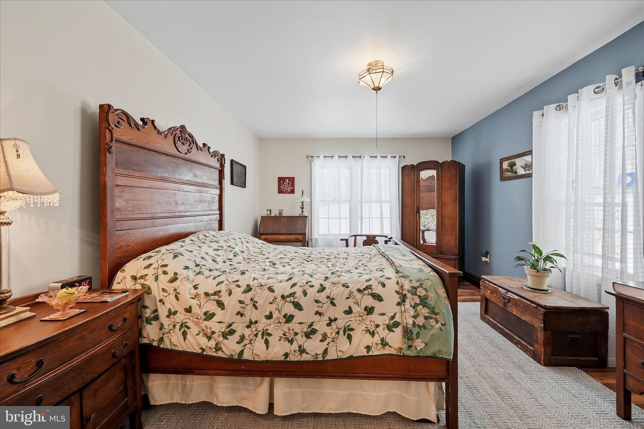 18758 Telegraph Springs Road Purcellville, VA 20132 - Photo 24 of 59 a bedroom with a bed and a dresser