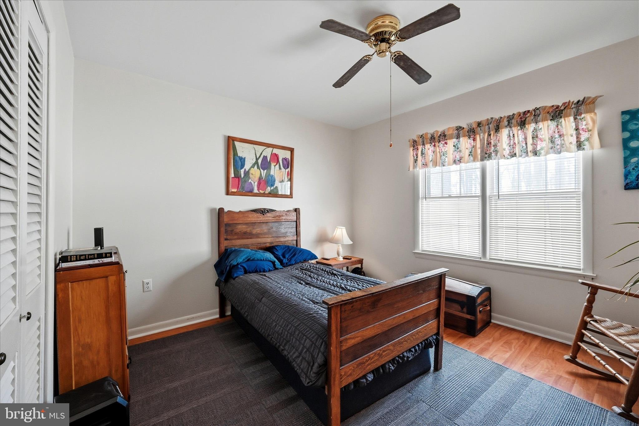 18758 Telegraph Springs Road Purcellville, VA 20132 - Photo 28 of 59 a bedroom with furniture and window