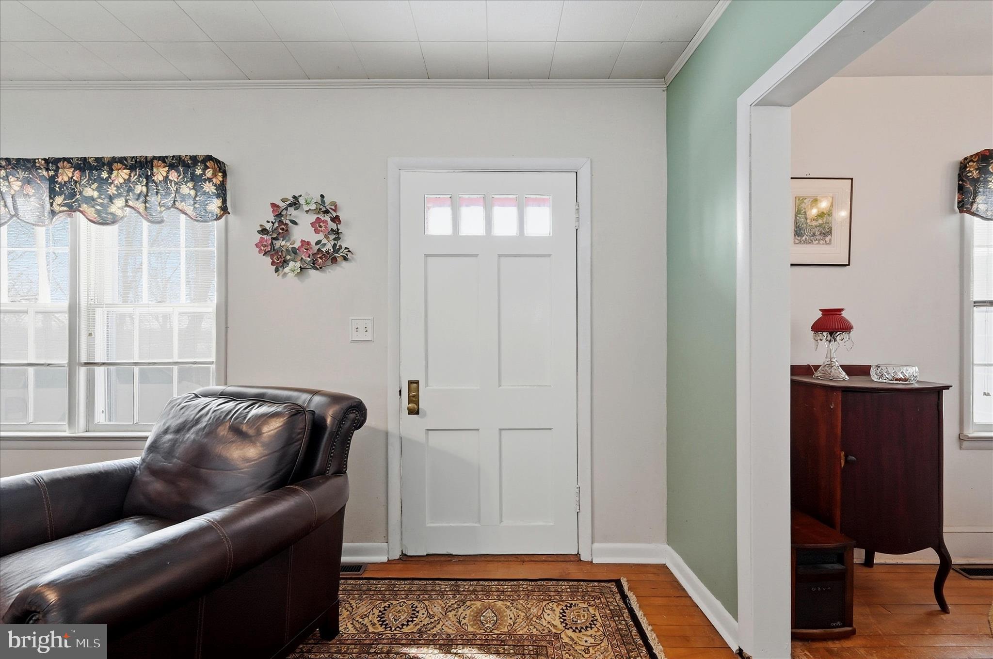 18758 Telegraph Springs Road Purcellville, VA 20132 - Photo 3 of 59 a living room with furniture and a window
