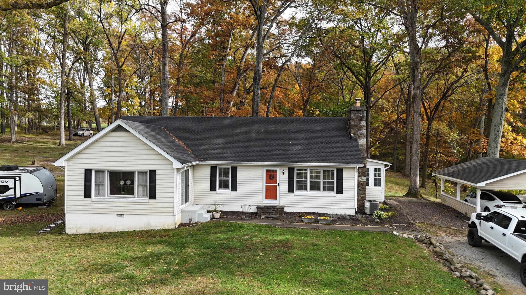 18758 Telegraph Springs Road Purcellville, VA 20132 - Photo 38 of 59 front view of a house with a yard
