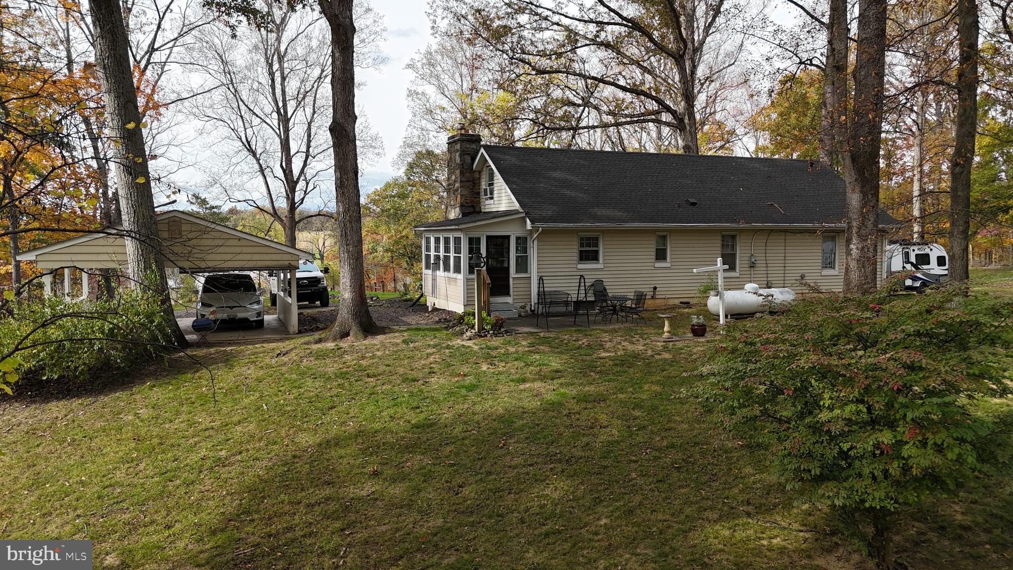 18758 Telegraph Springs Road Purcellville, VA 20132 - Photo 47 of 59 a front view of a house with garden