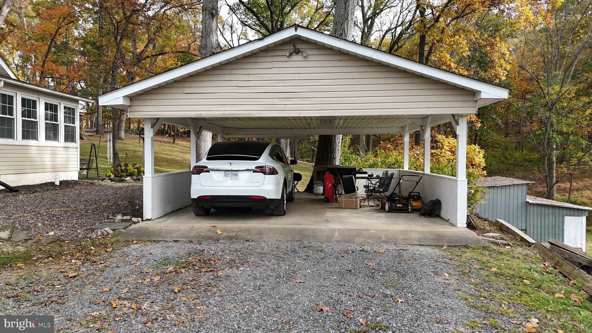 18758 Telegraph Springs Road Purcellville, VA 20132 - Photo 55 of 59 a view of a house with a patio
