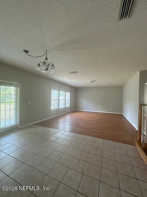 3790 Pondview Street Orange Park, FL 32065 - Photo 24 of 26 an empty room with windows and ceiling fan