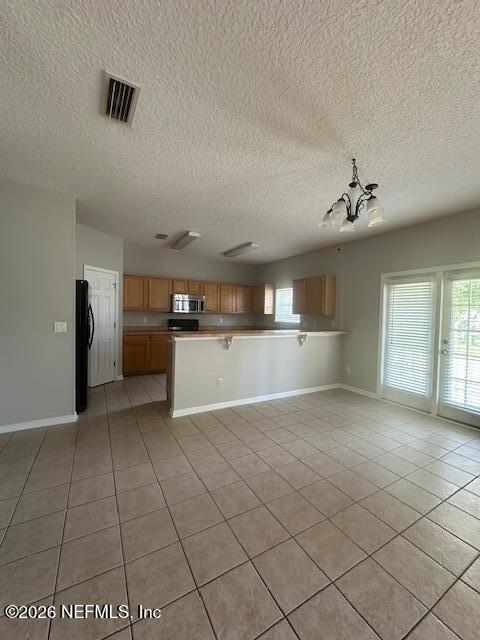 3790 Pondview Street Orange Park, FL 32065 - Photo 26 of 26 a view of a kitchen with a sink and a refrigerator
