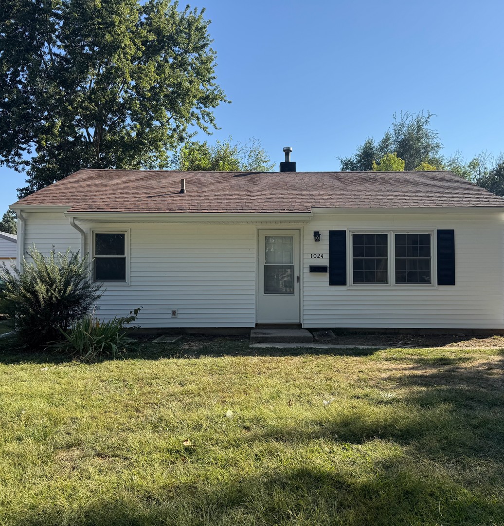 a house view with a garden space