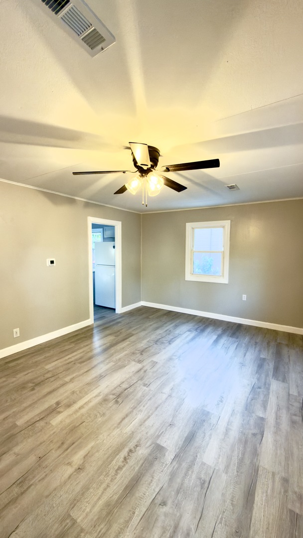 1024 Eastview Drive Rantoul, IL 61866 - Photo 6 of 12 wooden floor in an empty room